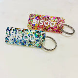 Porte-clés à paillettes BISOU