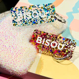 Porte-clés à paillettes BISOU