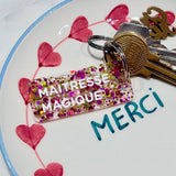 Porte-clés à paillettes MAITRESSE MAGIQUE